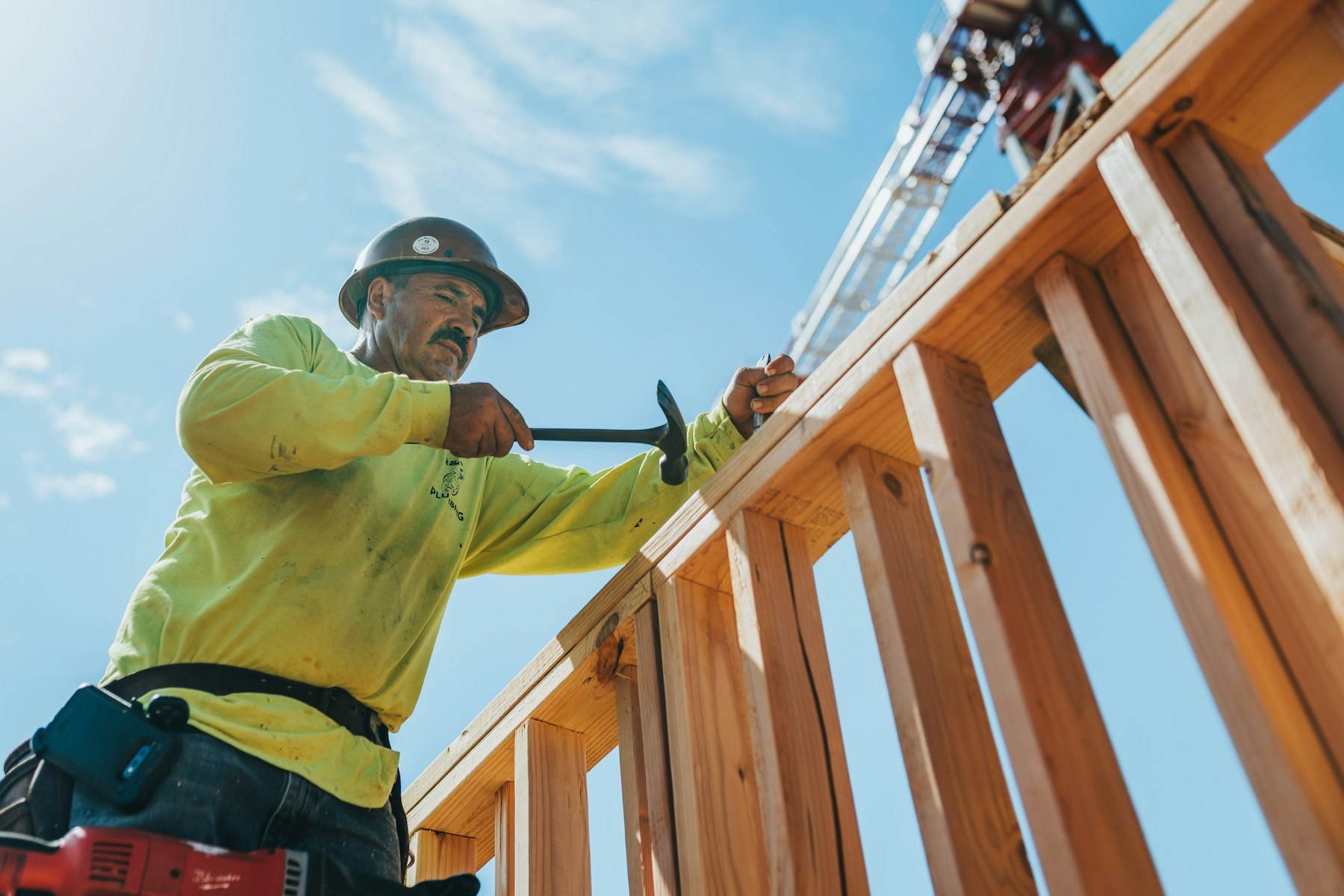 Framer working on a wooden structure